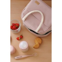 Poederroze geïsoleerde lunchtas